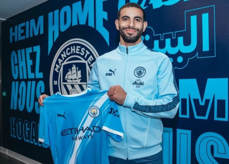 Rayan Ait-Nouri poses with Man City jersey Photo Courtesy: Man City