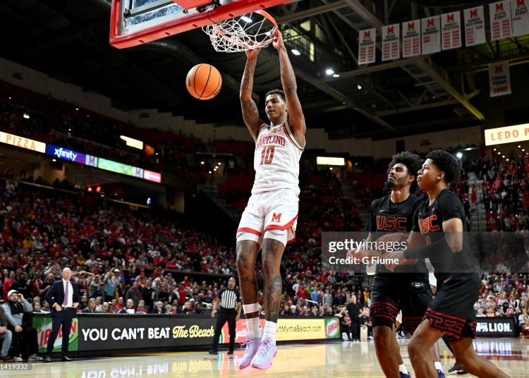 Julian Reese #10 of the Maryland Terrapins dunks the ball against the USC Trojans (Photo by G Fiume/Getty Images)