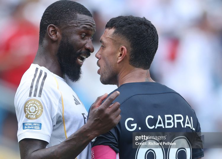 Gustavo Cabral #22 of CF Pachuca reacts with Antonio Ruediger #22 of Real Madrid C. F. during an altercation in the FIFA Club World Cup 2025 (Photo by Richard Pelham/Getty Images)
