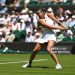 Aryna Sabalenka plays a backhand against Carson Branstine of Canada during the Ladies' Singles first round match on day one of The Championships Wimbledon 2025 (Photo by Mike Hewitt/Getty Images)