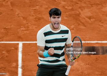 Carlos Alcaraz celebrates winning. (Photo by Antonio Borga/Eurasia Sport Images/Getty Images)