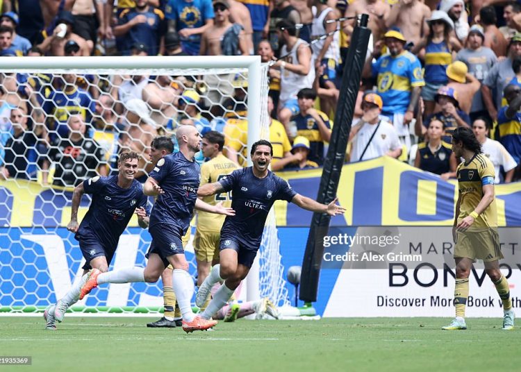 Christian Gray celebrates with Myer Bevan #7 and Nikko Boxall #5 after scoring his team's first goal on a header past Agustin Marchesin (not pictured) during the FIFA Club World Cup 2025 group C match between Auckland City FC and CA Boca Juniors  (Photo by Alex Grimm/Getty Images)