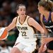 Caitlin Clark #22 of the Indiana Fever drives to the basket against Jacy Sheldon #4 of the Connecticut Sun (Photo by Brian Fluharty/Getty Images)