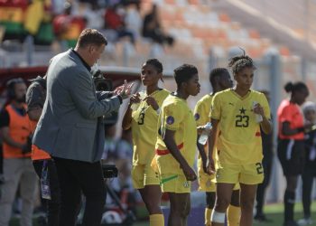Kim Lars Byokegren with some of the Black Queen Players during cooling Break. Photo Courtesy: GFA WNT X
