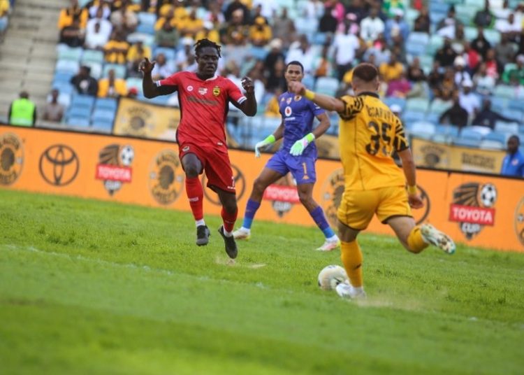 Kwame Opoku (red) in action against Kaizer Chiefs Photo Courtesy: AKSC