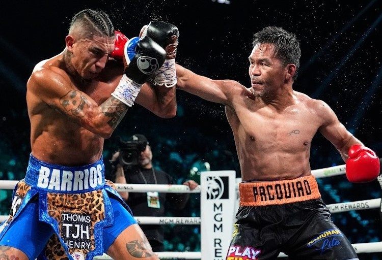 Manny Pacquiao lands punch on Mario Barrios Photo Courtesy: AP