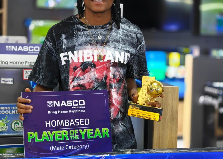 Razak Simpson after receiving his presents from Nasco