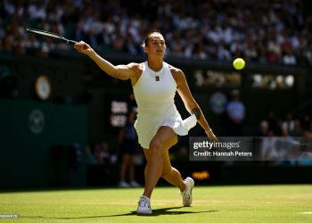 Aryna Sabalenka plays a forehand against Laura Siegemund of Germany during the Ladies' Singles quarter-final match on day nine of The Championships Wimbledon 2025 (Photo by Hannah Peters/Getty Images)