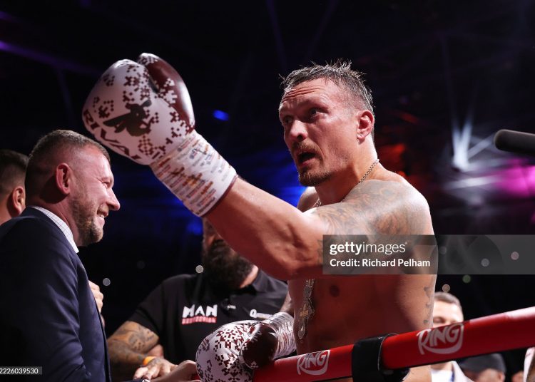 Oleksandr Usyk celebrates victory by knock out over Daniel Dubois (not pictured) after Referee Michael Griffin (not pictured) stops the bout during their IBF, IBO, WBC and WBO World Heavyweight titles' fight (Photo by Richard Pelham/Getty Images)