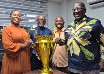Organizer of the Gbese Mantse Peace Cup , Samuel Anim Addo together with Head of News; Vivian Kai Lokko and Managing Director for Citi Fm and Channel One TV, Samuel Atta Mensah holding the Gbese Mantse Peace Cup