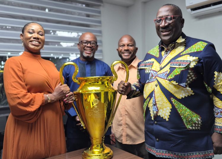 Organizer of the Gbese Mantse Peace Cup , Samuel Anim Addo together with Head of News; Vivian Kai Lokko and Managing Director for Citi Fm and Channel One TV, Samuel Atta Mensah holding the Gbese Mantse Peace Cup