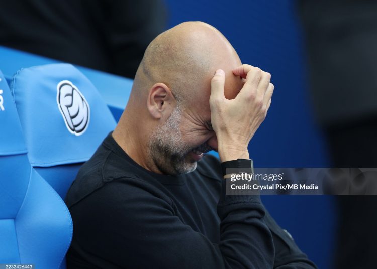 Josep Guardiola Manager of Manchester City looks worried during Premier League match (Photo by Crystal Pix/MB Media/Getty Images)