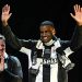 Newcastle United's English head coach Eddie Howe (L) applauds as Newcastle United's Alexander Isak celebrates on stage at the Town Moor in Newcastle upon Tyne, in north-east England, on March 29, 2025, during a celebration and presentation of the League Cup trophy with fans(Photo by OLI SCARFF/AFP via Getty Images)