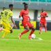 Kotoko midfielder Emmanuel Antwi (red) in action against Gold Stars in 2025 GHALCA Top 4 Photo Courtesy: Kotoko