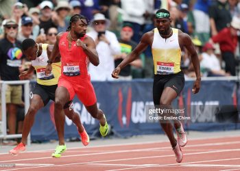 Noah Lyles reacts after winning the Xfinity Men's 200m final in front of Kenny Bednarek during the 2025 USATF Championship  (Photo by Emilee Chinn/Getty Images)
