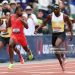 Noah Lyles reacts after winning the Xfinity Men's 200m final in front of Kenny Bednarek during the 2025 USATF Championship  (Photo by Emilee Chinn/Getty Images)