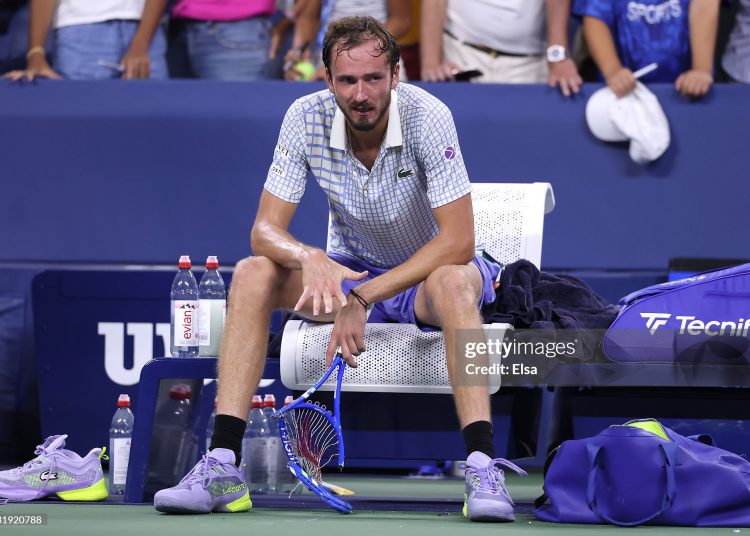 Daniil Medvedev breaks his racket after losing in five sets to Benjamin Bonzi of France during their Men's Singles First Round match on Day One of the 2025 US Open at USTA Billie Jean King National Tennis Center (Photo by Elsa/Getty Images)