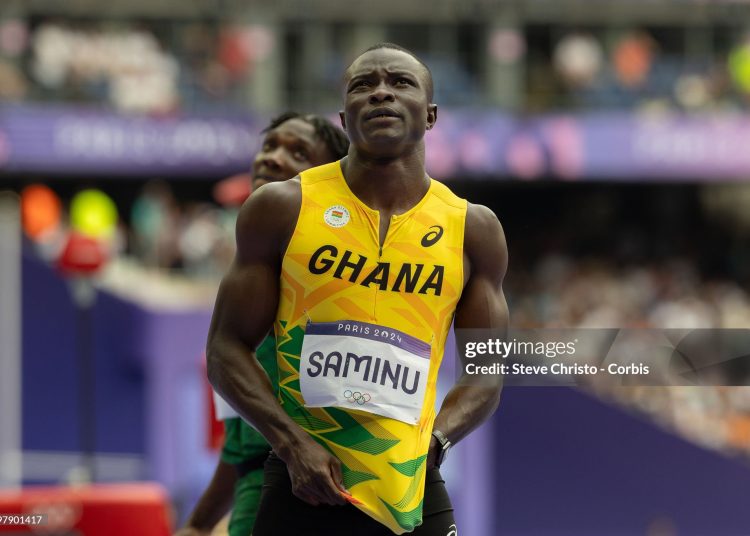 Abdul-Rasheed Saminu reacts during the Men's 100m heats on day eight of the Olympic Games Paris 2024 at Stade de France . (Photo by Steve Christo - Corbis/Corbis via Getty Images)