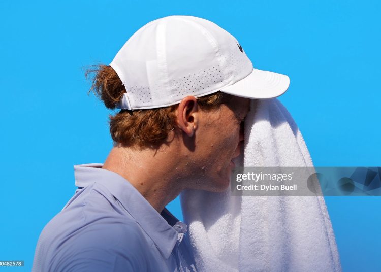 Jannik Sinner of Italy wipes his face with a towel during the match against Térence Atmane of France during Day 10 of the Cincinnati Open at the Lindner Family Tennis Center (Photo by Dylan Buell/Getty Images)