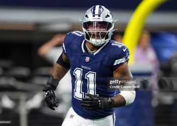 Micah Parsons #11 of the Dallas Cowboys celebrates during an NFL football game (Photo by Cooper Neill/Getty Images)