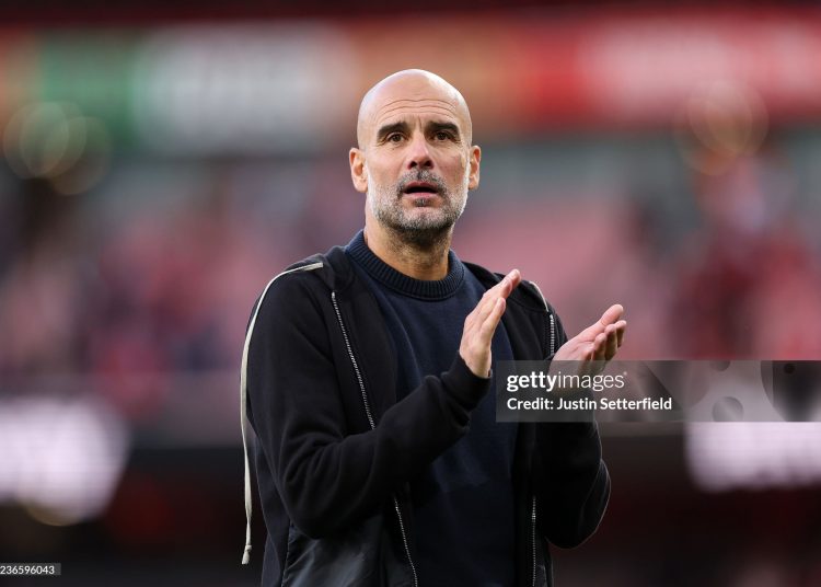 Pep Guardiola, Manager of Manchester City, applauds the fans after Premier League match (Photo by Justin Setterfield/Getty Images)
