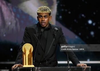 Lamine Yamal speaks on stage with the Men's Kopa Trophy during the 69th Ballon D'Or Ceremony (Photo by Kristy Sparow - UEFA/UEFA via Getty Images)