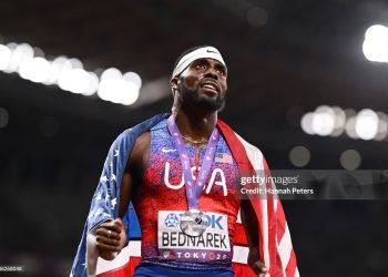 Silver medalist Kenneth Bednarek of Team United States celebrates with the national flag after competing in the Men's 200 Metres Final on day seven of the World Athletics Championships Tokyo 2025 (Photo by Hannah Peters/Getty Images)