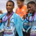 Bronze medalist Bayapo Ndori of Team Botswana (R) and gold medalist Busang Collen Kebinatshipi of Team Botswana (L) pose for a photo with the national flag of Botswana after competing in the Men's 400 Metres Final (Photo by Andrzej Iwanczuk/NurPhoto via Getty Images)