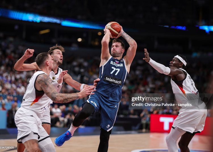 Luka Doncic of Slovenia, Daniel Theis of Germany, Franz Wagner of Germany, Isaac Bonga of Germany during FIBA EuroBasket 2025 game (Photo by Christina Pahnke - sampics/Corbis via Getty Images)