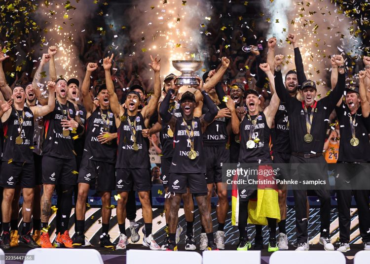 The Germany team with Dennis Schröder of Germany celebrates with their gold medals and trophy after winning the championship during the FIBA Eurobasket 2025 final (Photo by Christina Pahnke - sampics/Corbis via Getty Images)