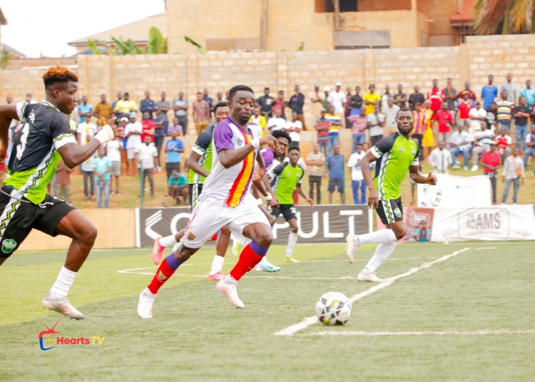 Dreams FC in action against Hearts of Oak (white) Photo Courtesy: Hearts TV