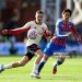 Florian Wirtz of Liverpool controls the ball whilst under pressure from Daichi Kamada of Crystal Palace during the Premier League match between Crystal Palace (Photo by Tom Dulat/Getty Images)