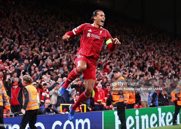 Virgil van Dijk of Liverpool celebrates after scoring a goal to make it 3-2 during the UEFA Champions League 2025/26 League Phase MD1 match (Photo by Robbie Jay Barratt - AMA/Getty Images)