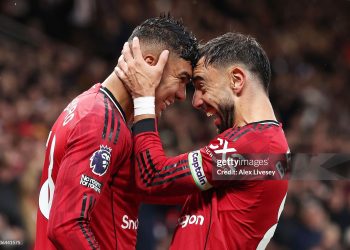 Casemiro of Manchester United celebrates scoring his team's second goal with teammate Bruno Fernandes during the Premier League match between Manchester United and Chelsea (Photo by Alex Livesey/Getty Images)