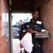 Clarke Oduor of Grimsby Town arrives at the stadium prior to Carabao Cup Second Round match  (Photo by George Wood/Getty Images)