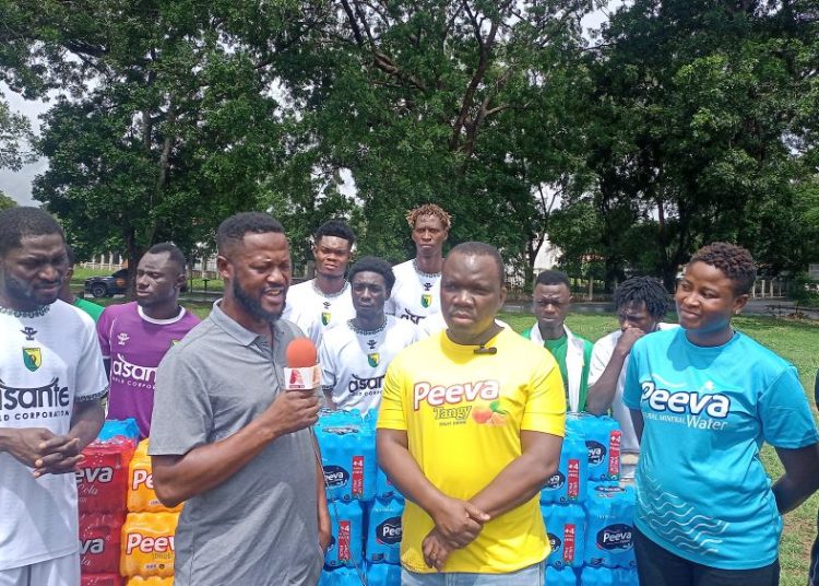 Bibiani Gold Stars CEO Akwasi Adu (left) with Peeva Beverages CEO Frank Adjei Mensah