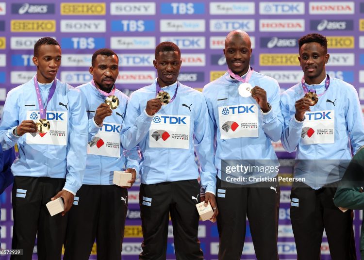 Gold medalist athletes of Team Botswana pose for a photo on the podium during the Men's 4x400 Metres Relay medal ceremony on day nine of the World Athletics Championships Tokyo 2025 (Photo by Christian Petersen/Getty Images)