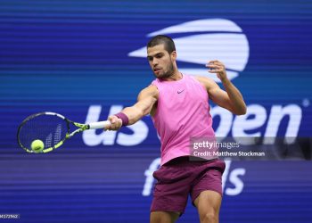 Carlos Alcaraz of Spain returns against Jannik Sinner of Italy during their Men's Singles Final match on Day Fifteen of the 2025 US Open (Photo by Matthew Stockman/Getty Images)