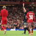 Hugo Ekitike of Liverpool celebrates scoring his team's second goal by removing his match shirt and subsequently receives a second yellow card from Referee Thomas Bramall to be sent off during the Carabao Cup Third Round match between Liverpool and Southampton at Anfield on September 23, 2025 in Liverpool, England. (Photo by Jan Kruger/Getty Images)