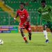 Peter Amidu (red) in action for Kotoko against Gold Stars Photo Courtesy: AKSC