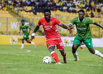 Albert Amoah (with ball) in action for Kotoko against Gold Stars Photo Courtesy: AKSC