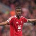 Alexander Isak of Liverpool reacts during the Premier League match between Liverpool and Manchester United (Photo by Carl Recine/Getty Images)