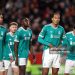 Virgil van Dijk of Liverpool looks on alongside teammates during the Premier League match between Brentford and Liverpool (Photo by Alex Pantling/Getty Images)
