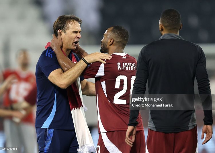 Julen Lopetegui, Head Coach of Qatar, embraces Ahmed Fathy of Qatar after the team's victory in the FIFA World Cup 2026 qualifier match between Qatar and United Arab Emirates (Photo by Mohamed Farag/Getty Images)