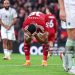 Cody Gakpo of Liverpool reacts during the Premier League match between Liverpool and Manchester United at Anfield (Photo by Robbie Jay Barratt - AMA/Getty Images)