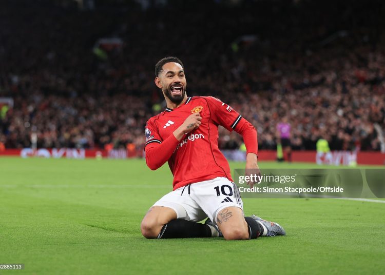 Matheus Cunha of Manchester United celebrates after scoring their 1st goal during the Premier League match between Manchester United and Brighton & Hove Albion (Photo by Simon Stacpoole/Offside/Offside via Getty Images)