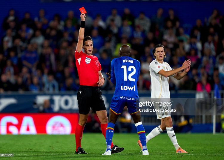 Allan Nyom of Getafe CF gets a red card during the LaLiga EA Sports match between Getafe CF and Real Madrid CF (Photo by Diego Souto/Getty Images)
