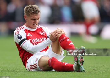 Arsenal's Martin Odegaard sustains an injury during the Premier League match between Arsenal and West Ham United (Photo by Rob Newell - CameraSport via Getty Images)