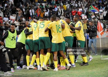 South Africa players celebrate during the 2026 FIFA World Cup qualifier match (Photo by Charlé Lombard/Gallo Images/Getty Images)