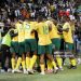South Africa players celebrate during the 2026 FIFA World Cup qualifier match (Photo by Charlé Lombard/Gallo Images/Getty Images)